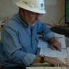 Employee examining written records | Photo: BLM